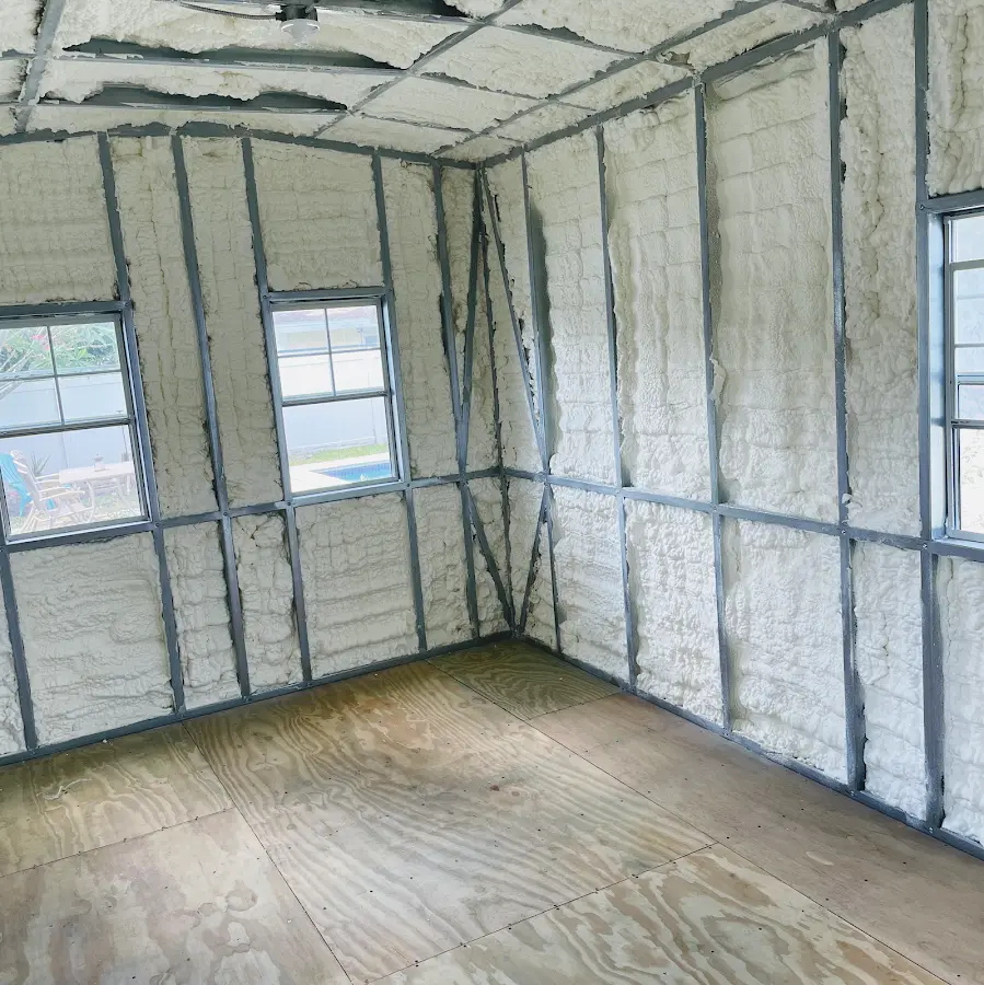 Closed-cell spray foam insulation applied to wall cavities in a residential project in Upper Sandusky